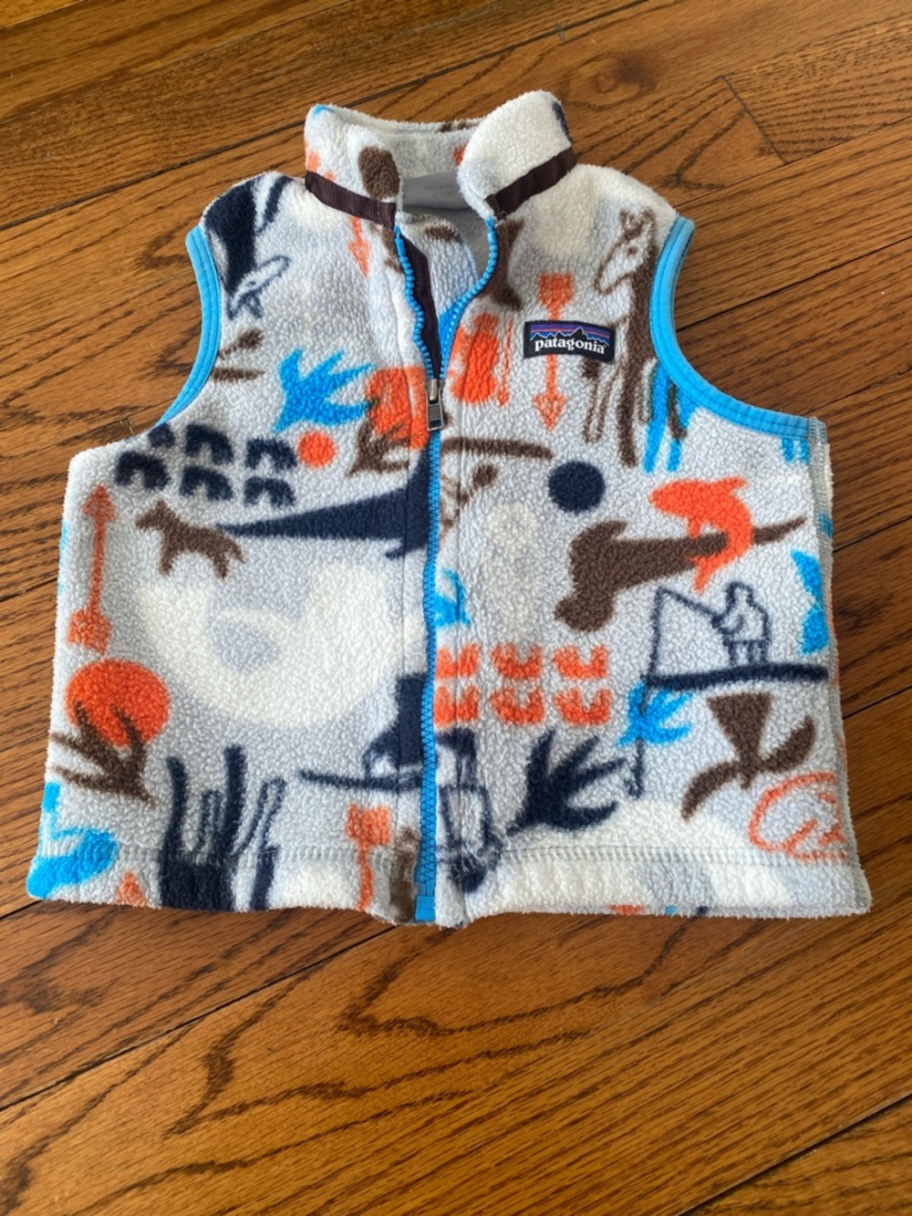 Patagonia Cream Fleece Vest with Blue & Orange Accents size 6 to 12 months